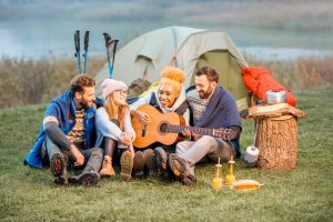 Friends In Sweaters During The Outdoor Recreation best outdoor clothing