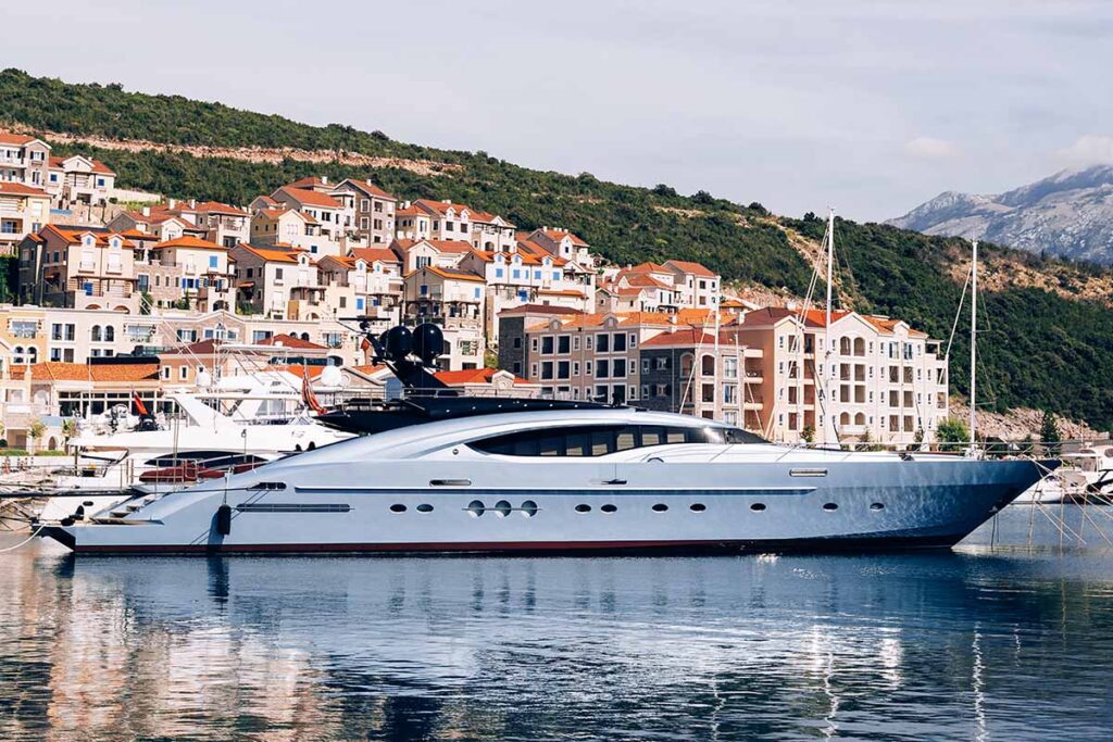 expensive yacht is moored at the pier of the lusti AFF3A3R