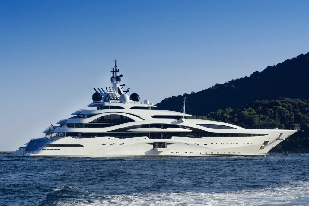 huge luxury yacht cruising offshore BTRMDJZ